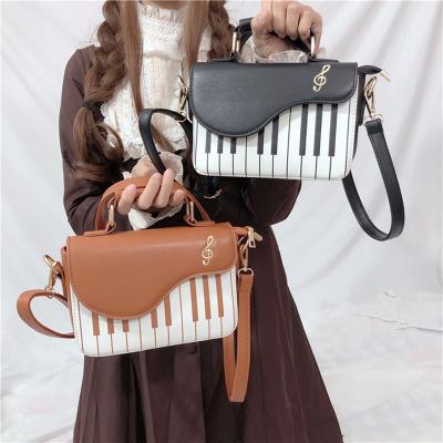 China Unoque design durable and superior shoulder handbags for women custom fashionable luxury lolita party piano shape bag handbags for sale