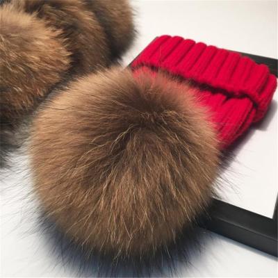 China 2020 Winter COMMON Fur Pom Pom Hat For Women Knit Raccoon Beanie Winter Fur Pom Pom Wool Hats High Quality Real for sale