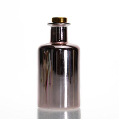 China Fashionable Wholesale Crystal Golden 250ml Aroma Glass Bottle Round Electroplate Diffuser Bottle for sale