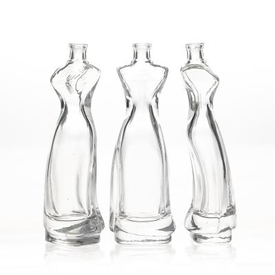 China Ladies Or Girls Elegant Woman Shape Glass Perfume Bottle With Crimp Cap for sale