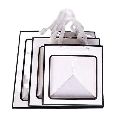 China Recyclable Custom Logo Kraft Paper Bag With PVC Clear Clear Fashion Window Gift Flower Transparent Paper Bag for sale