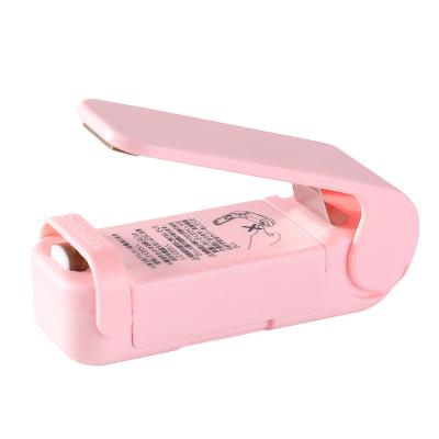 China New Arrival Reusable Mini Portable Hand Press ABS Plastic Heat Seal Machine For Plastic Bags for sale