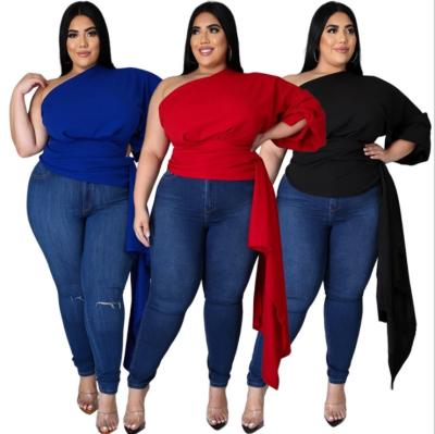 China Newly Designed Breathable Asymmetric Shirt And Women Tops With Sloping Shoulders Puffed Sleeves Solid Color Plus Size Tops And Blouse for sale