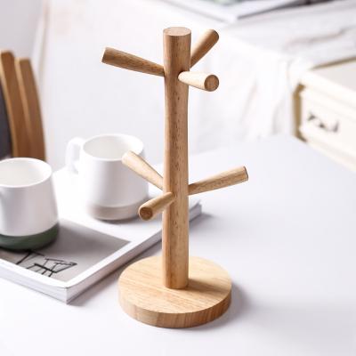 China Household serise hot sale creative coffee cup upside down display racks household water wooden cup holder for sale