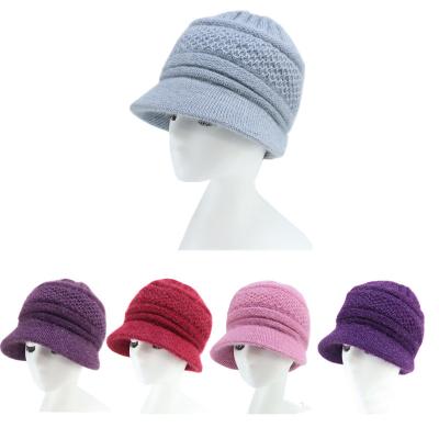 China breathable & Waterproof 2021 Acrylic Knitted Winter Hats Woman Furry Stripe Knit Beanies for sale