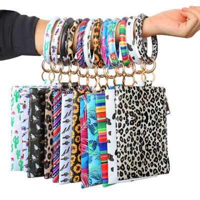 China 2022 Amazon Hot Selling Waterproof Women PU Leather Tassel Wristband Key Chain Wallet Phone Bag for sale