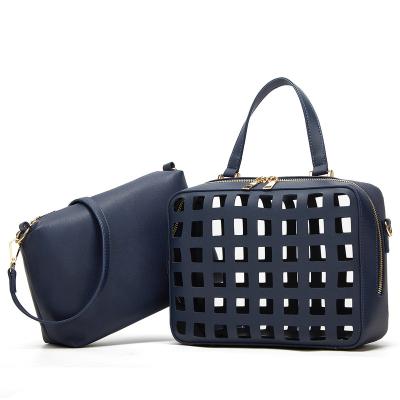 China 2 Pieces Set The Latest 2 Pieces Of Tote Bag And Make Up Women PU Leather Bag Designer Trending 2022 Handbags for sale