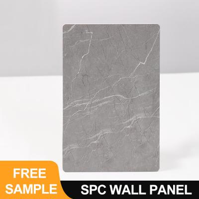 China Painel de parede SPC por atacado de novos materiais 600*2440*4mm impermeável PVC pedra plástico Eco-friendly folha de mármore placa sem costura para chuveiro e banheiro à venda