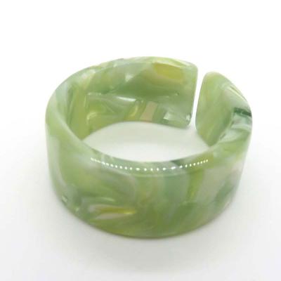 China Cute Customized Design Girls Kids Ring Wholesale Solid Color Plastic Women Lady Rings for sale