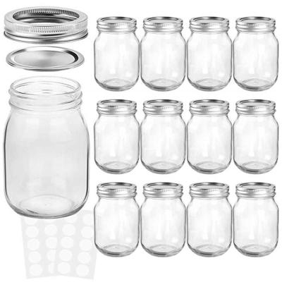 China Clear 16OZ Sustainable Glass Mason Jar With Metal Lid Wide Mouth Mason Jar for sale