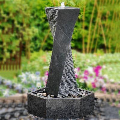 China Modern Simple Pillar Black Carved Helix Ribbed Natural Stone Water Decorative Granite Fountain For Garden Park Ornament for sale