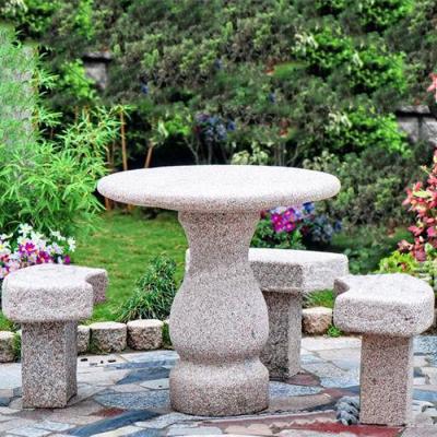 China Modern Round Natural Granite Hand Carved Outdoor Garden Decorative Stone Dining Boulder Rest Table And Curve Bench Chair Set Modern for sale