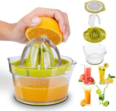 China Viable 3 in 1 Vegetable Fruit Grater with Built-in Manual Orange Citrus Juicer Plastic Measuring Cup Lemon Squeezer for sale