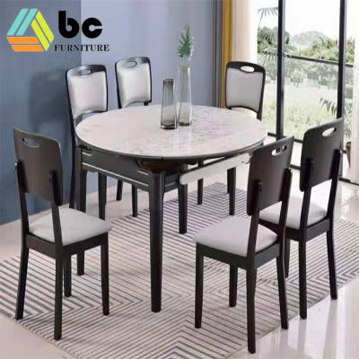 China (Other)Adjustable Cheap Dining Table With 6 Chairs Set Solid Wood Adjustable Folding Dining Room Furniture With Stone Top for sale