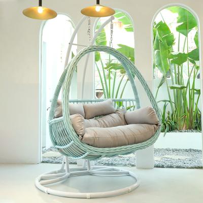 China Contemporary Outdoor Garden Furniture Wholesale Price Rattan Steel Double Seater Cushion Hanging Swivel Egg Chair for sale