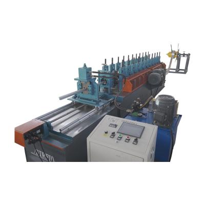 China Hotels T-Shape Ceiling Baked Painting Skittle Making Machine T-Hoop Bar Ceiling Skittle Roll Forming Machine for sale