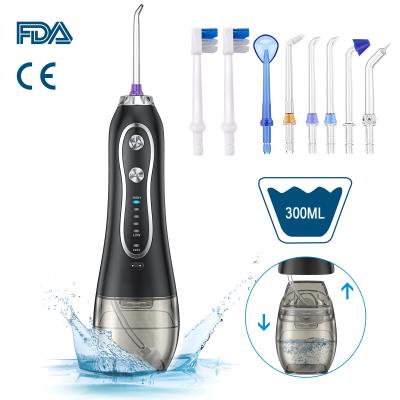 China Household Ipx7 Waterproof 8 Nozzles Portable Waterproof Teeth Clean Usb Wireless Dental Care Irrigator Water Flosser For Teeth for sale