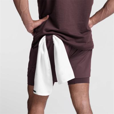 China Cool Anti-wrinkle Man Sports Wear Custom Logo Men's Running Workout Shorts Boxer GYM 2 IN 1 Shorts Jiu-Jitsu Perforated Shorts for sale