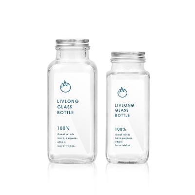 China Factory direct 250ml 350ml custom empty clear glass beverage bottle with screw cap for juice tea milk for sale