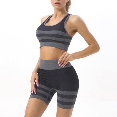 China Seamless Sportswear Ladies 2 Piece Set Women's Spot Yoga Suit Striped Quick-drying Yoga Vest High Waist Sexy Sports Bra Lifting Big Sale for sale