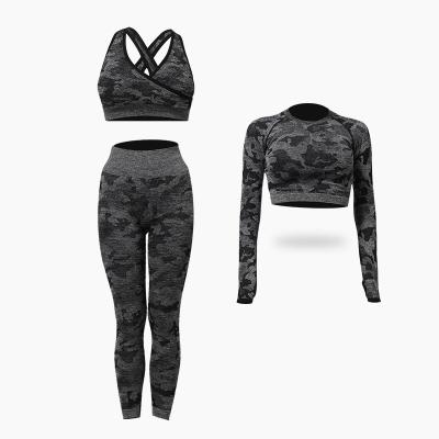 China New Breathable Seamless Workout Yoga Set Wholesale Custom Seamless Fitness Yoga Set 3 Piece Camouflage Gym Equipment Gaiters Workout Pants for sale