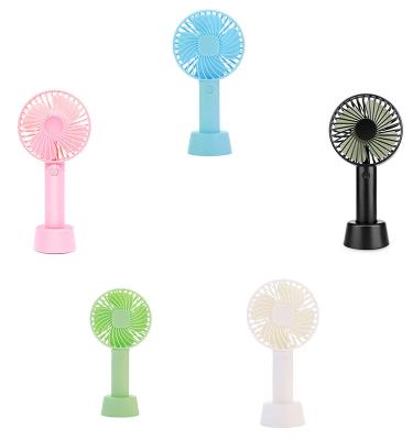 China Travel Portable and Rechargeable Home Hanging Stand Up Charging Desktop Volume Mini Fan Hand Held Rechargeable Portable Battery Operated for sale