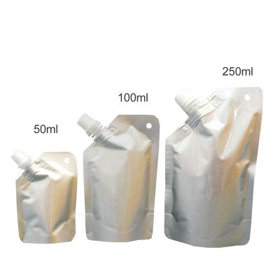 China 50ml 100ml 250ml 500ml Aluminum Foil Liquid Moisture Proof Silver Holder Up Spout Pouch With Corner Spout for sale