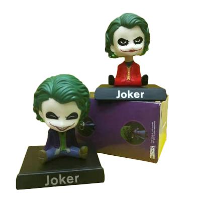 China 4 inch hot sale cartoon toy in car shaking toy car head decoration shaking toy joker head toy for sale