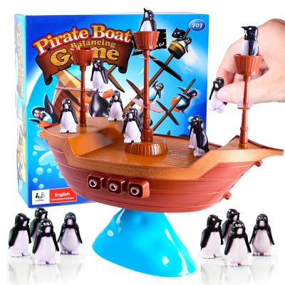 China Eco-friendly Material Boys Rocking Penguins Play Pirate Ship Game On Table for sale