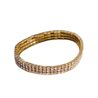 China TRENDY The top quality GOLD CLEAR 18K GOLD PLATED Elestics rhinestone chain bracelet for sale