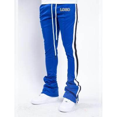 China Anti-wrinkle fashion men's slim fit cotton piled pants with side stripe drawstring casual jogger colorful pants outfits empty track sweatpants for sale