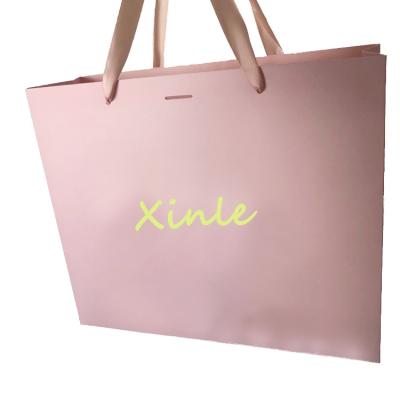 China Recyclable Customized Logo Design Paper Luxury Gift Bag Packaging Bag Customized Shopping Paper Bag With Ribbon Handle for sale