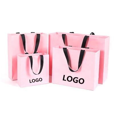 China Recyclable Custom Paper Shopping Bag Logo Printed Matt Finish Pink with Grosgrain Ribbon Handle for sale