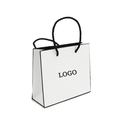 China Recyclable Handmade Sugar Paper Bag Slogan Customized Packaging Designs for sale