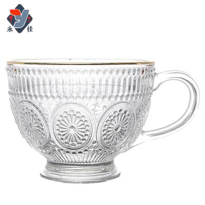 China Viable Retro HOT Sunflower Embossed Milk Cup Home Glass Cup With Handle Phnom Penh Amber Breakfast Cup for sale