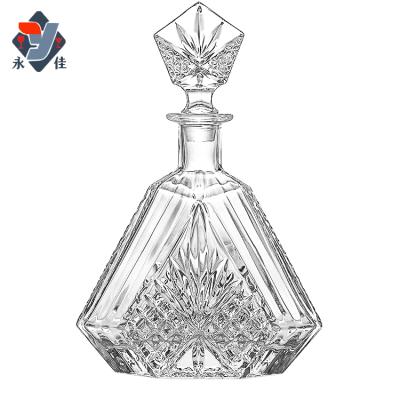 China Sustainable Wholesale Frosted Clear Decorative Blown Glass Liquor Glass Fancy Wine Bottles for sale