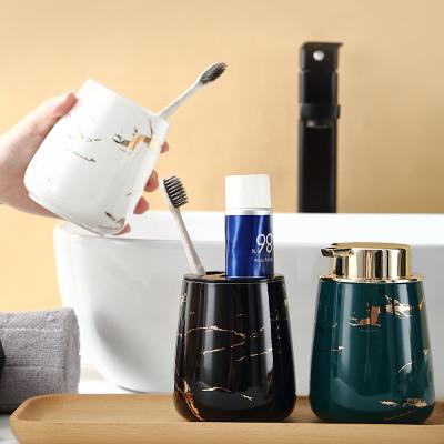 China Sustainable Modern Luxury Marble Pattern Ceramic Cup Toothbrush Set Bathroom Ceramic Toothbrush Holder for sale