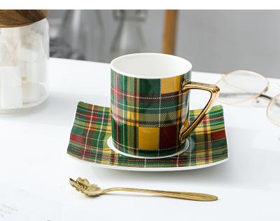 China Viable Ceramic Amazon Success Office Gold Plaid Porcelain Cup and Saucer Plaid Pottery Teacup for sale