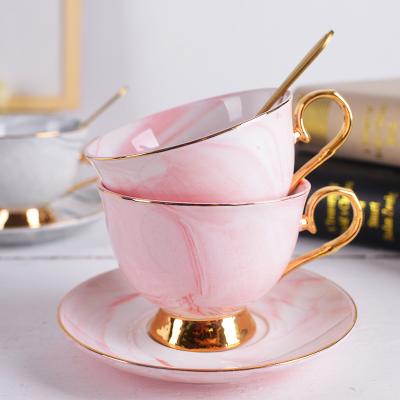 China Wholesale Viable Rose Gold Ceramic Cup And Saucer Handle Design Marble Cup And Saucer for sale