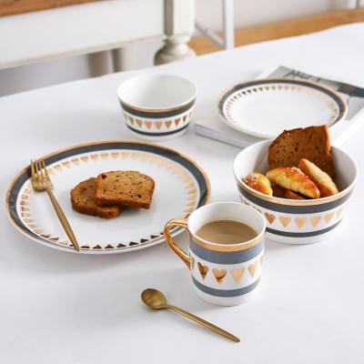 China Sustainable Ceramic Gold Plating Dishes And Bowls Hotel Porcelain Dinnerware Set From Northern Europe for sale