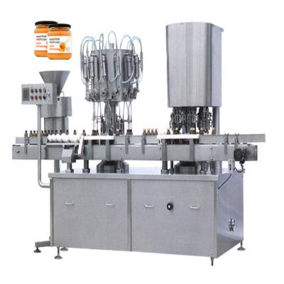 China Automatic Food Honey Meat Paste Small Glass Bottle Liquids Production Line Piston Filling Capping Machines With Conveyor Belt for sale