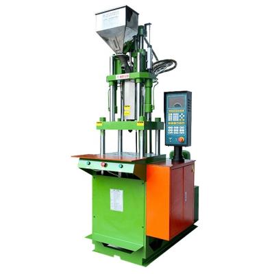 China Vertical thermoplastic tube head Tools handle plastic injection molding machine for sale