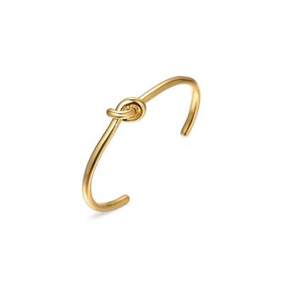 China Fashion High Quality 18K Gold Plating Brass Jewelry Knot Design TRENDY C-shaped Open Cuff Bracelet For Women Gift Party B4286 for sale