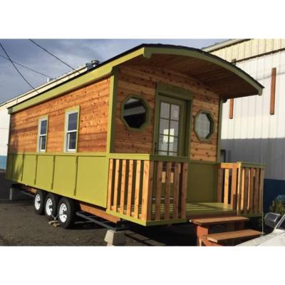 China Middle East Travel Camper Prefab Wooden Home Tiny Caravan Trailer Mobile Cabin Home With Wheels for sale