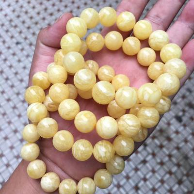 China Amber Diameter 10-12mm Polishing White Amber Bracelets Natural Russian High Quality Tiger Skin And Muslim Prayer Beads for sale