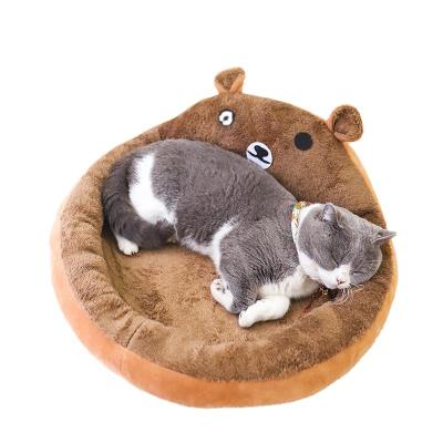 China Petshop Puppy Cooling Bed Around Soft Donut Cat Bed Perros de Para Cama Plush Cat Protector Bed for sale