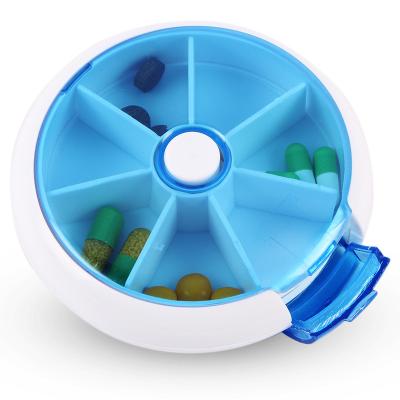 China Weekly PP Pill Box Travel Pill Organizer 7 Revolving Compartments Size 7 Days Medicine Organizer Portable Round Purse for sale