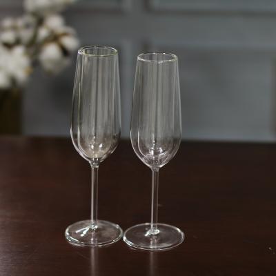 China Premium Design Lead Free Elegant Hand Made Crystal Swollen Champagne Flute Glass Goblet Wine Glasses For Wedding for sale