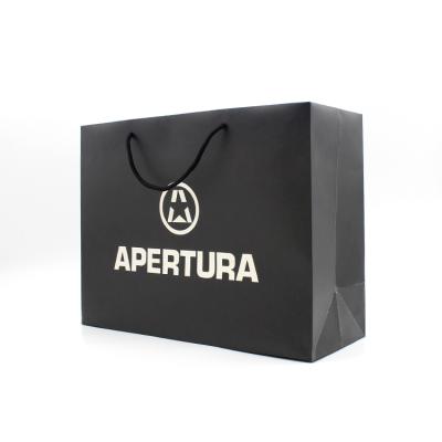 China Recyclable Custom Logo Printing Apparel Black Shopping Paper Bag for sale