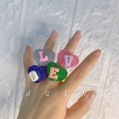 China Cute YJ21R60 Personalized Letter Love Glitter Heart Resin Hyperbolic Yes Women Rings for sale